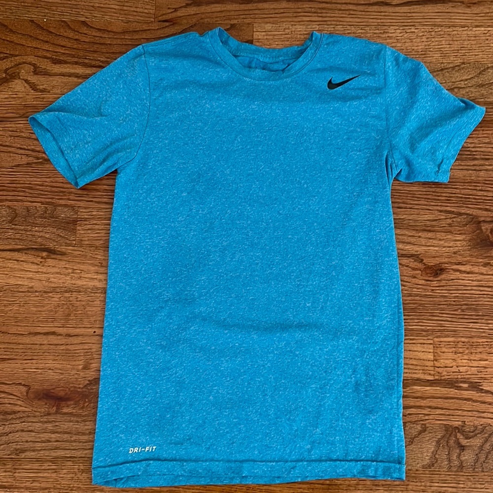 The Nike tee Dri-fit. Size small aqua blue. Excellent pre-owned condition.